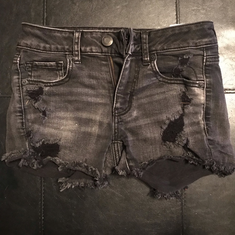 Faded black short jean shorts.